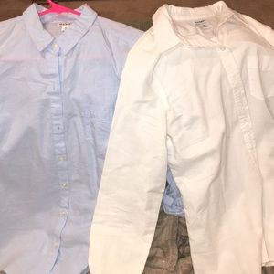 Two womens button ups together